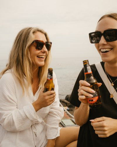 Enjoying an Estrella de Galicia with sea views